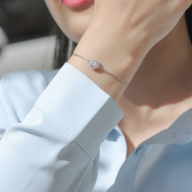 HNJ Jewels Timeless Moissanite Halo Round Cut Bracelet In Sterling Silver
